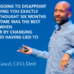 David Cancel speaking on stage. There's a quote overlaying the image, which says 